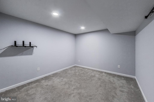  - carpeted empty room featuring baseboards and recessed lighting