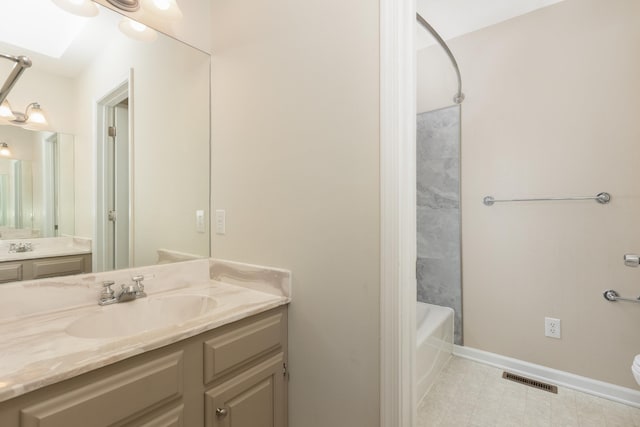 640 Greenwood St, Rockingham, VA 22801 - full bath featuring vanity, washtub / shower combination, baseboards, and toilet