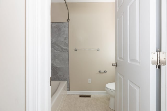 640 Greenwood St, Rockingham, VA 22801 - bathroom featuring tile patterned flooring, toilet, shower / tub combination, and baseboards