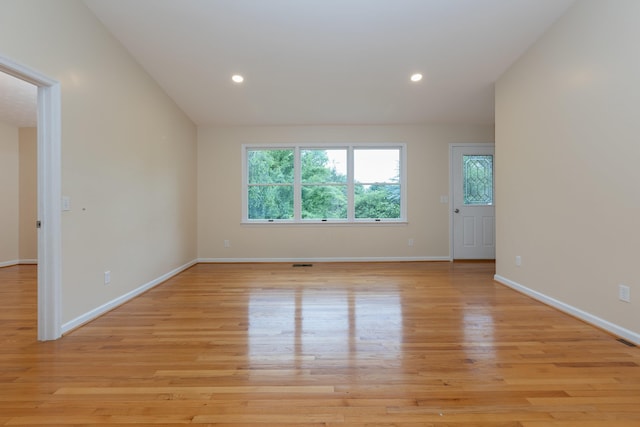 640 Greenwood St, Rockingham, VA 22801 - spare room with healthy amount of natural light, light wood finished floors, baseboards, recessed lighting, and lofted ceiling