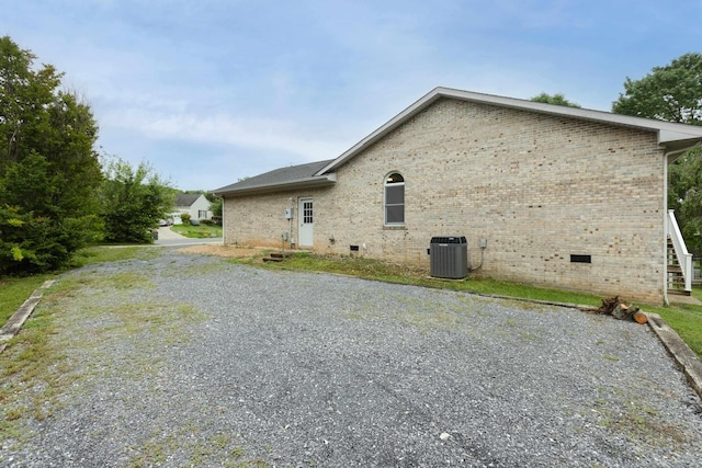640 Greenwood St, Rockingham, VA 22801 - view of side of property with cooling unit, crawl space, and brick siding