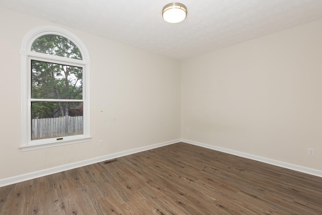 640 Greenwood St, Rockingham, VA 22801 - spare room featuring dark wood-type flooring and baseboards