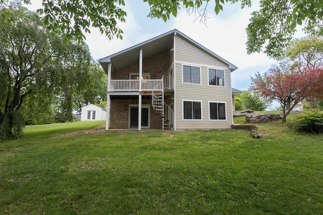 640 Greenwood St, Rockingham, VA 22801 - rear view of property featuring a yard, a wooden deck, and brick siding