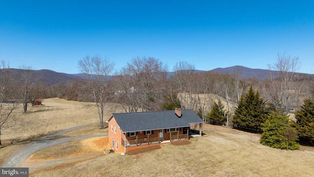 aerial view featuring a mountain view