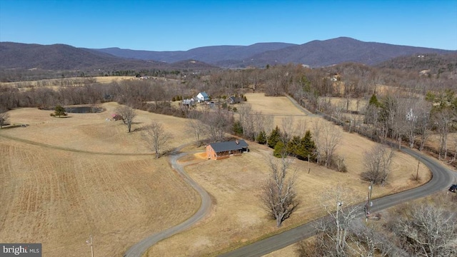 drone / aerial view with a rural view and a mountain view