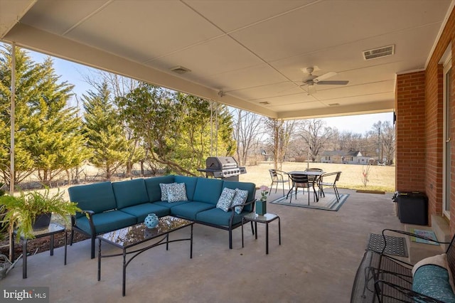 view of patio featuring visible vents, area for grilling, a ceiling fan, an outdoor living space, and outdoor dining area