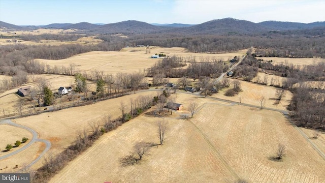 bird's eye view with a mountain view and a rural view