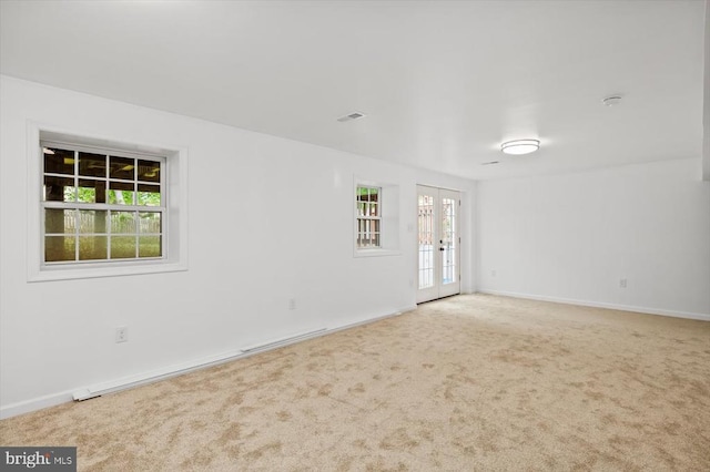 7400 Harvest Ln, Fredericksburg, VA 22407 - empty room with carpet, plenty of natural light, french doors, and baseboards