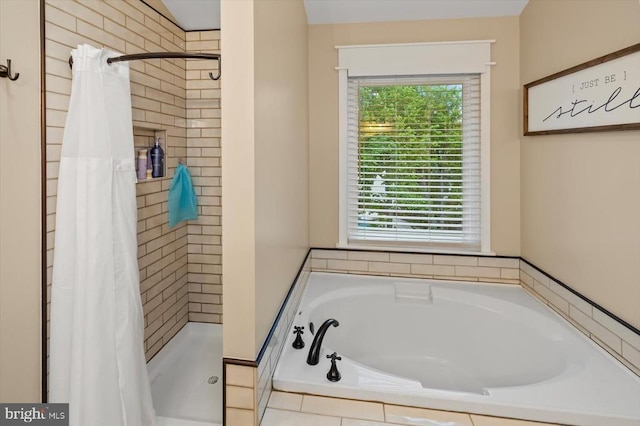 7400 Harvest Ln, Fredericksburg, VA 22407 - bathroom featuring a bath and a shower stall