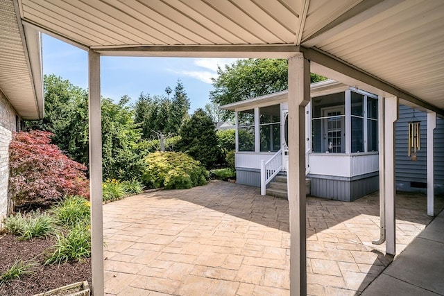 404 3rd St, Grottoes, VA 24441 - view of patio with a sunroom and entry steps