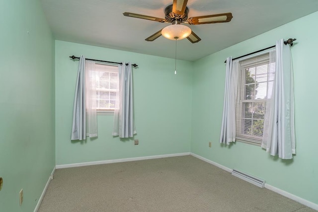 404 3rd St, Grottoes, VA 24441 - carpeted spare room featuring plenty of natural light, baseboards, and ceiling fan
