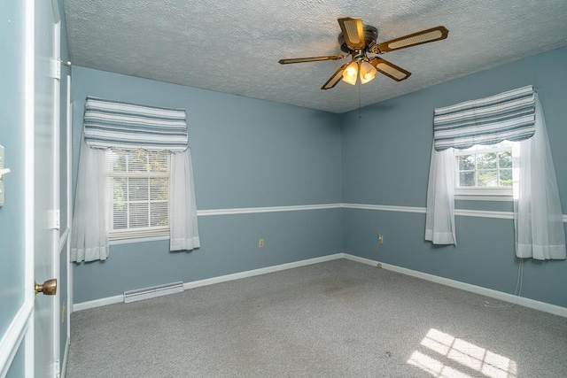 404 3rd St, Grottoes, VA 24441 - carpeted spare room with a textured ceiling, a ceiling fan, and baseboards