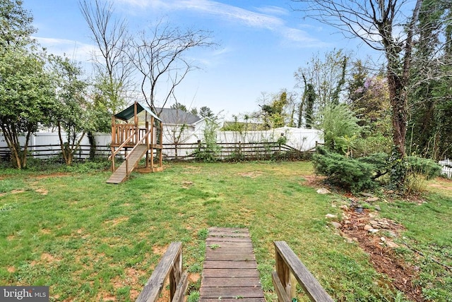 view of yard with a playground
