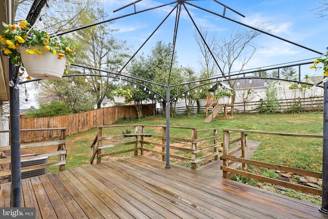 wooden deck with a playground