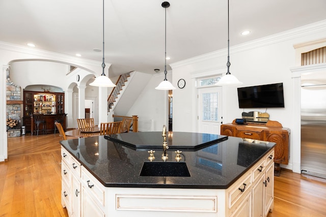 1767 Goose Creek Rd, Waynesboro, VA 22980 - kitchen featuring decorative columns, light wood-style flooring, crown molding, hanging light fixtures, and stainless steel built in fridge