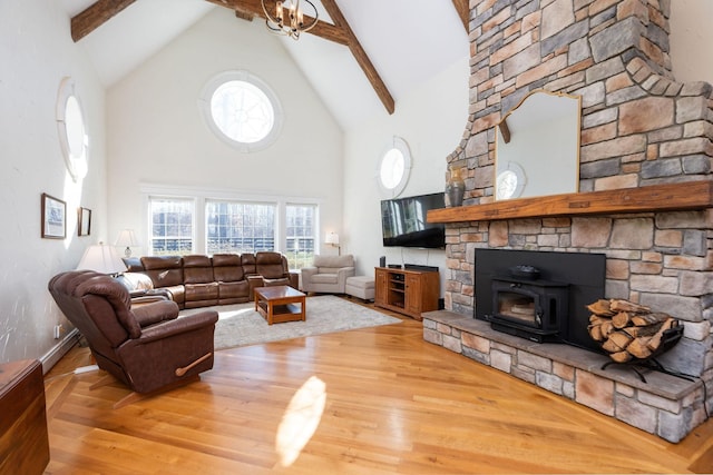 1767 Goose Creek Rd, Waynesboro, VA 22980 - living room featuring beam ceiling, high vaulted ceiling, wood finished floors, plenty of natural light, and baseboards
