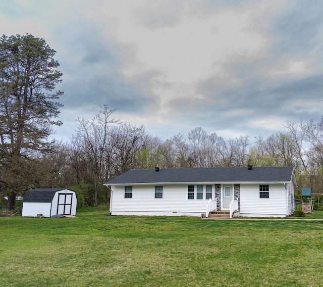 2786 Fleeburg Rd, Shenandoah, VA 22849 - rear view of house with a storage unit, crawl space, a yard, and an outbuilding
