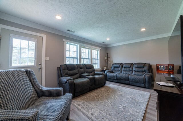2786 Fleeburg Rd, Shenandoah, VA 22849 - living area featuring recessed lighting, a textured ceiling, ornamental molding, visible vents, and wood finished floors