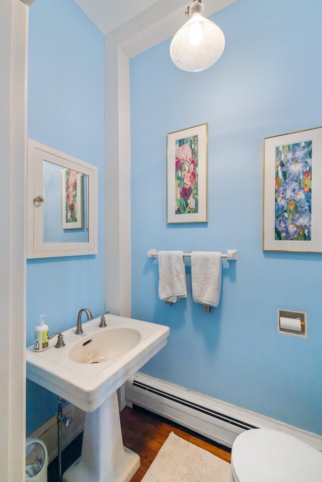 633 Wayne Ave S, Waynesboro, VA 22980 - bathroom with a baseboard radiator, wood finished floors, and toilet