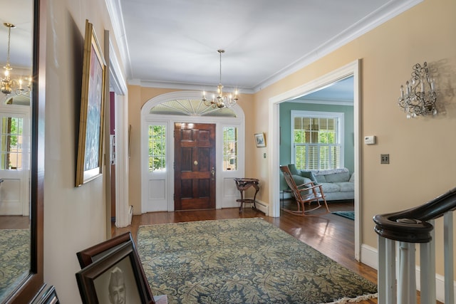 633 Wayne Ave S, Waynesboro, VA 22980 - entrance foyer with a chandelier, wood finished floors, ornamental molding, and baseboards