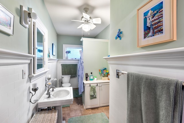 633 Wayne Ave S, Waynesboro, VA 22980 - bathroom featuring a ceiling fan, tile patterned floors, vaulted ceiling, and a sink