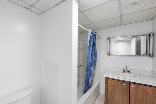 633 Wayne Ave S, Waynesboro, VA 22980 - bathroom with a drop ceiling, toilet, tile patterned flooring, vanity, and shower / bath combination with curtain