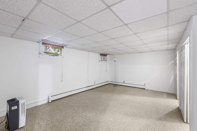 633 Wayne Ave S, Waynesboro, VA 22980 - below grade area with a paneled ceiling, a baseboard radiator, baseboard heating, baseboards, and carpet