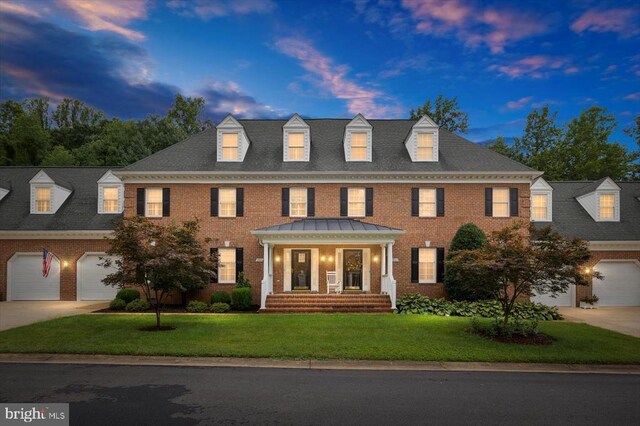 3905 Corbin Hall Ln, Fredericksburg, VA 22408 - colonial inspired home with driveway, a front yard, and brick siding