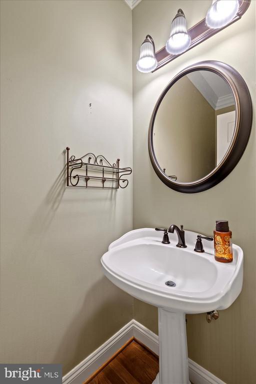 3905 Corbin Hall Ln, Fredericksburg, VA 22408 - bathroom featuring baseboards and wood finished floors