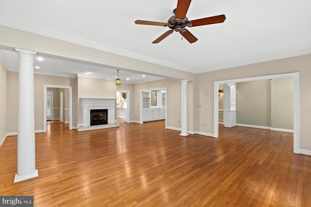 3905 Corbin Hall Ln, Fredericksburg, VA 22408 - unfurnished living room featuring ceiling fan, light wood finished floors, recessed lighting, ornamental molding, and ornate columns