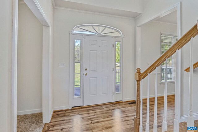 1130 Race Ground Rd, Rochelle, VA 22738 - entrance foyer with stairs, a wealth of natural light, crown molding, and wood finished floors
