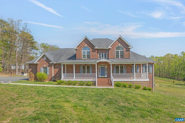 1130 Race Ground Rd, Rochelle, VA 22738 - view of front of property featuring covered porch, brick siding, and a front yard