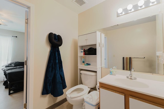 510 Davis Mills Dr Unit 103, Harrisonburg, VA 22801 - half bathroom featuring toilet, vanity, and ceiling fan
