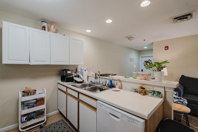 510 Davis Mills Dr Unit 103, Harrisonburg, VA 22801 - kitchen featuring dishwasher, a peninsula, a sink, white cabinetry, and light countertops