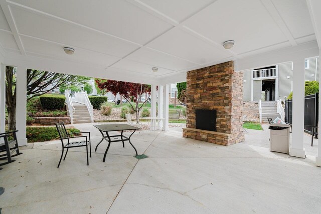 510 Davis Mills Dr Unit 103, Harrisonburg, VA 22801 - view of patio with an outdoor stone fireplace and stairs