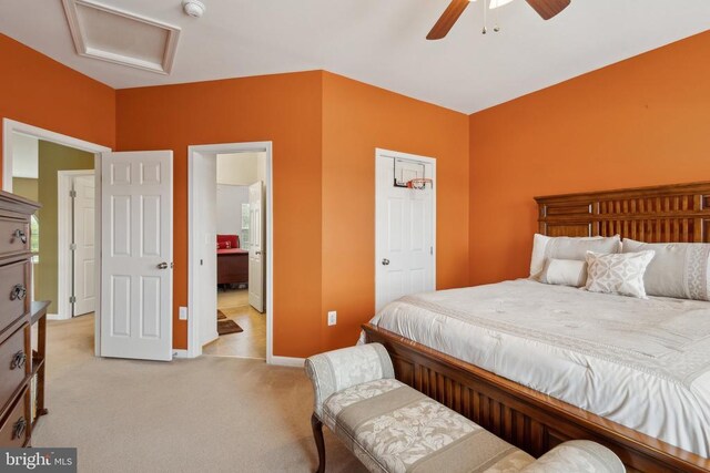 5831 Deep Creek Dr, Fredericksburg, VA 22407 - bedroom with light carpet, attic access, baseboards, a ceiling fan, and connected bathroom