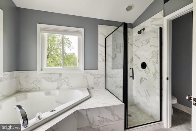 full bathroom with toilet, marble finish floor, a bath, and a marble finish shower