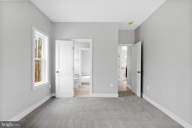 10643 Settle School Rd, Rixeyville, VA 22737 - unfurnished bedroom with baseboards, connected bathroom, and carpet floors