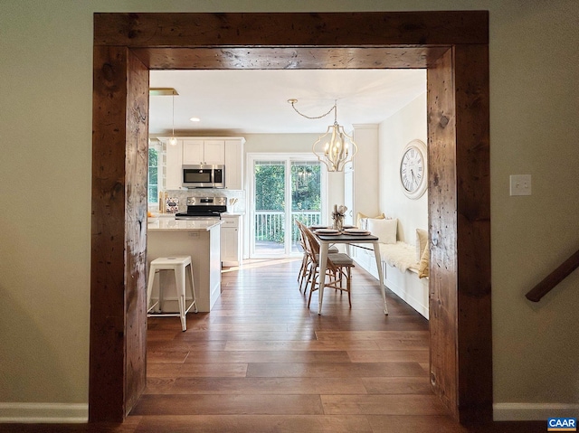 1203 Afton Mountain Rd, Afton, VA 22920 - dining room with dark wood-style floors and a chandelier