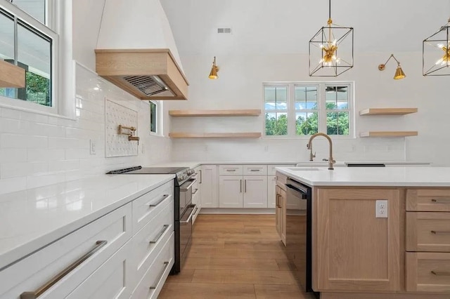 TBD Hermitage Rd, Waynesboro, VA 22980 - kitchen with range with two ovens, black dishwasher, custom exhaust hood, a sink, and open shelves