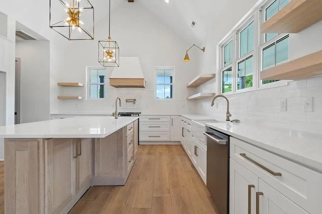 TBD Hermitage Rd, Waynesboro, VA 22980 - kitchen with stainless steel dishwasher, open shelves, custom exhaust hood, and a chandelier