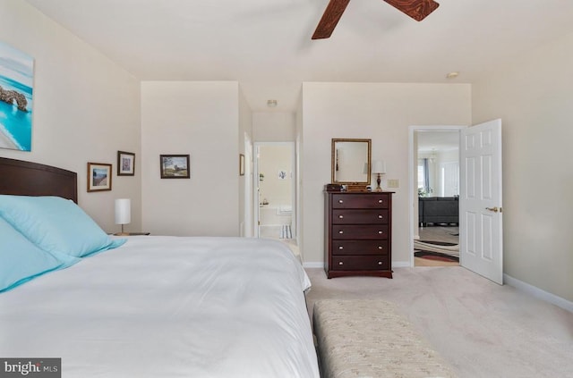 11200 Scottwood Ln N, Fredericksburg, VA 22407 - carpeted bedroom with connected bathroom and a ceiling fan