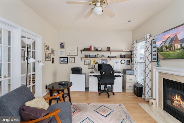 11200 Scottwood Ln N, Fredericksburg, VA 22407 - office space featuring a ceiling fan, wood finished floors, a fireplace, and french doors