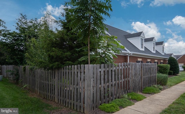 11200 Scottwood Ln N, Fredericksburg, VA 22407 - view of home's exterior with brick siding and a shingled roof