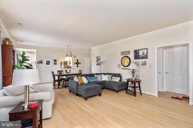 11200 Scottwood Ln N, Fredericksburg, VA 22407 - living room featuring light wood-style flooring and ornamental molding
