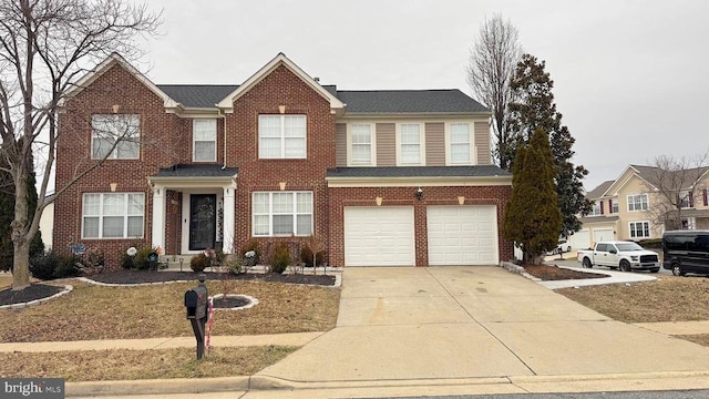 view of front of property with a garage