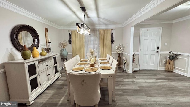 dining area with crown molding and dark wood-type flooring