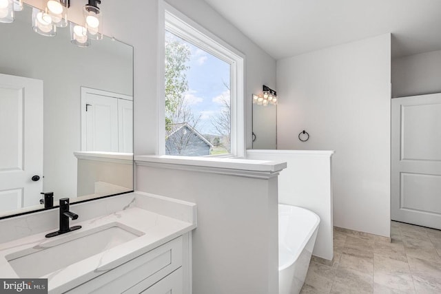 26437 Pennfields Dr, Orange, VA 22960 - full bathroom with a freestanding tub, vanity, and a chandelier