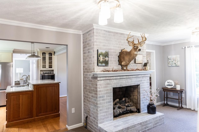 1014 22nd St E, Buena Vista, VA 24416 - living room with a brick fireplace, crown molding, and a textured ceiling