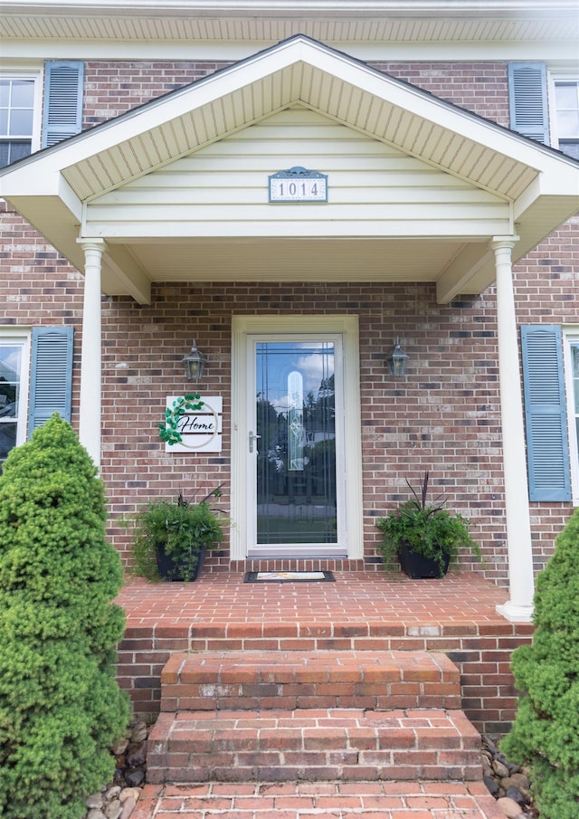 1014 22nd St E, Buena Vista, VA 24416 - entrance to property featuring brick siding and a porch